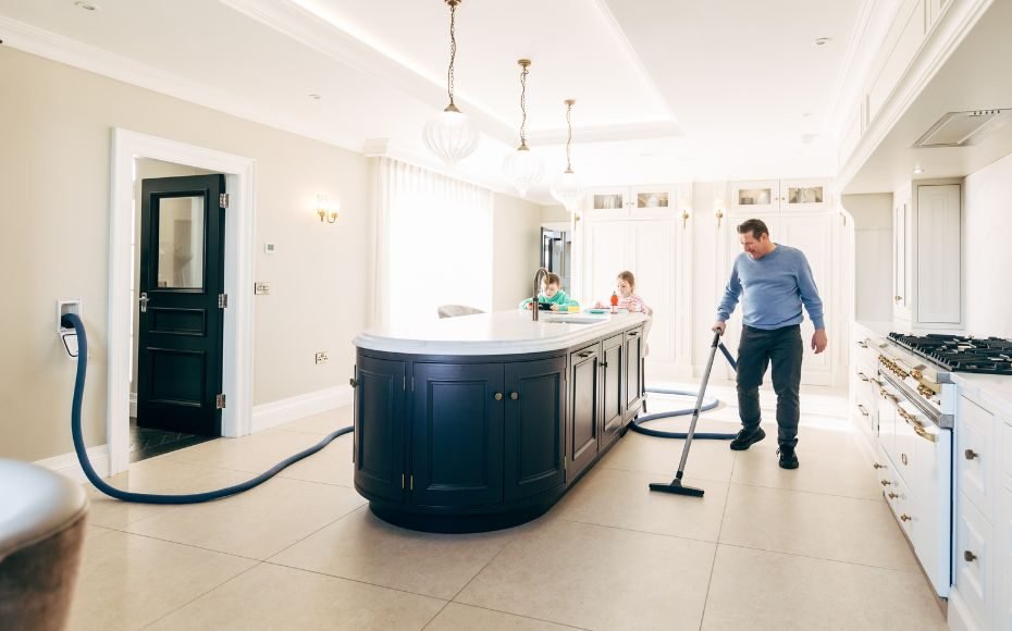 central vacuum system being used in kitchen